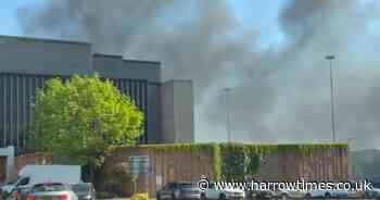 Huge fire engulfs cars outside north London shopping centre