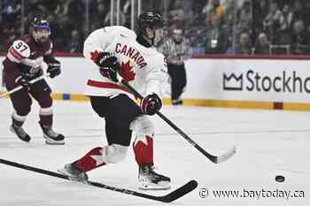 US blanks newcomer Hungary for 2nd straight shutout at hockey worlds, Canada routs Latvia