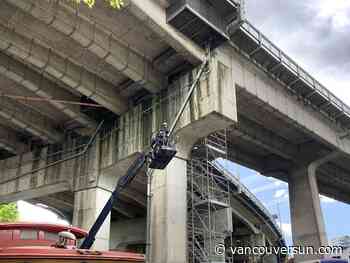 Company contracted to repaint Granville Street Bridge for $5.8 million sues City of Vancouver