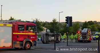 Car lands on its side after two-vehicle crash in Bristol