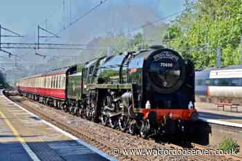 Commuters 'astonished and awed' as historic locomotive steams through