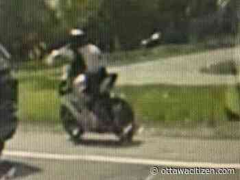 OPP officer struck by biker stopped for driving on 417 shoulder