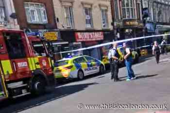 LIVE as police close Stoke Newington High Street as air ambulance lands in park