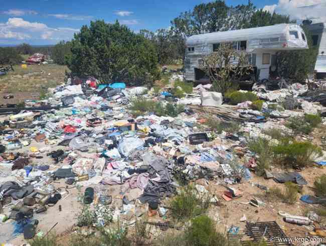 Volunteers fill two dumpsters with trash from Santa Fe National Forest campsite