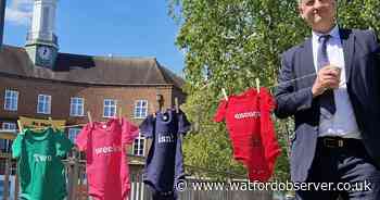 'Two weeks isn't enough' - MP hangs out babygrows to highlight dad crisis