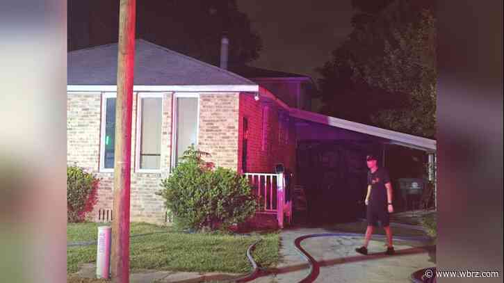 Four adults, two children displaced after early morning house fire