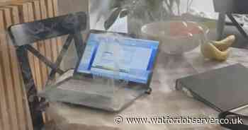 Terrifying moment laptop spontaneously catches fire at Hertfordshire home