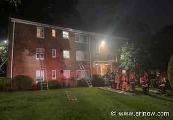 Two hospitalized after apartment fire with ladder evacuations