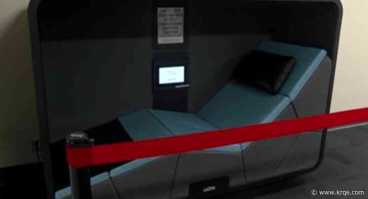 Students install nap pods at the University of New Mexico