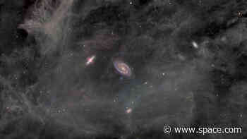 Amateur astronomer captures Cigar Galaxy and Bode's Galaxy swimming in a spectral nebula (photo)