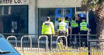 Boy 'falls through building' in town centre