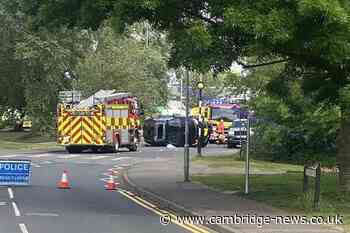 Man taken to hospital after car overturns in Cambridgeshire town