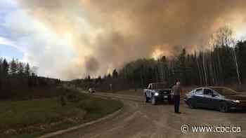 Firefighters battling Nopiming wildfire in 'protection mode' to save buildings, cabins