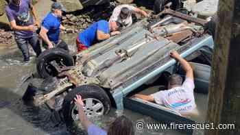 Off-duty Mass. FFs rescue 3 from car overturned in water