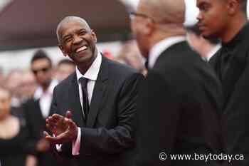 Denzel Washington receives surprise honorary Palme d'Or at Cannes premiere for 'Highest 2 Lowest'