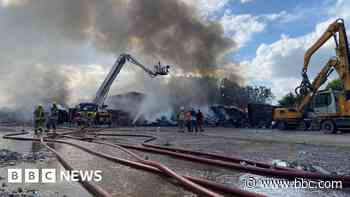 Recycling centre blaze 'probably caused by battery'