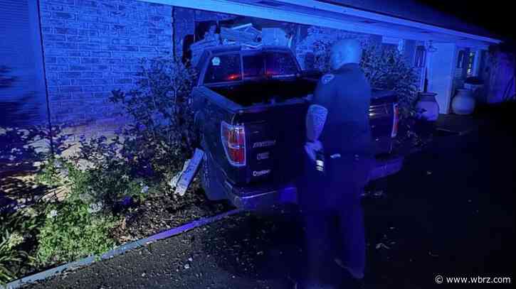 Alleged drunk driver barrels into front of New Roads home