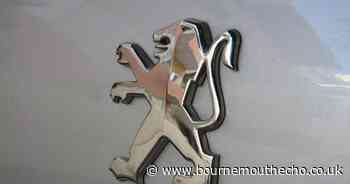 Man taken to hospital after car flips over at roundabout