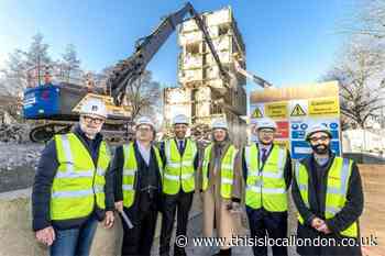 Demolition of last building marks milestone in 1,500-home project