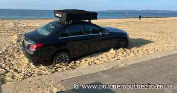 Car appears to be stranded on Bournemouth beach once again