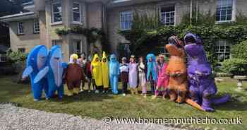 Mums dress in fancy costumes for egg and spoon race at sports day