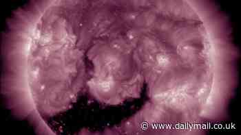 Earth to be hit by powerful shockwave in just HOURS after giant 'claw-shaped' hole bursts through the sun