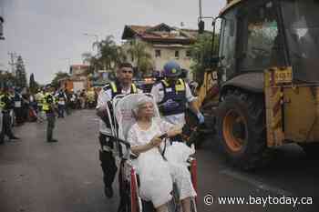 Israel’s defense minister warns 'Tehran will burn' if Iran continues firing missiles
