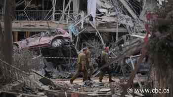 Israeli defence minister warns Iran will pay a heavy price if it continues retaliatory missile strikes