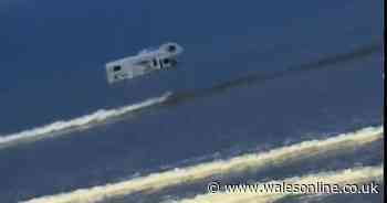 Campervan swamped by sea at notorious Welsh beach