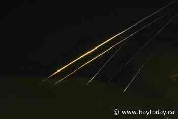 Israel’s military says the latest missiles from Iran are incoming, and explosions are heard overhead