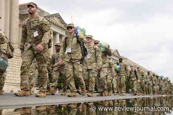 Military parade barrels through DC with tanks, troops and 21-gun salute