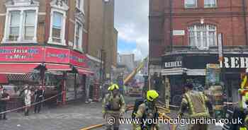 'Avoid' area as 70 firefighters tackle HUGE storage blaze near Brixton station