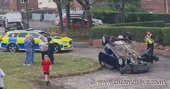 Police searching for occupants of car which overturned after colliding with Kenton garden wall