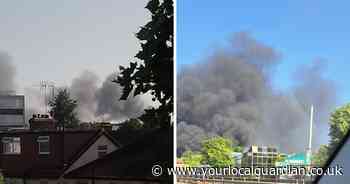 LIVE updates as huge plumes of black smoke seen over Tolworth