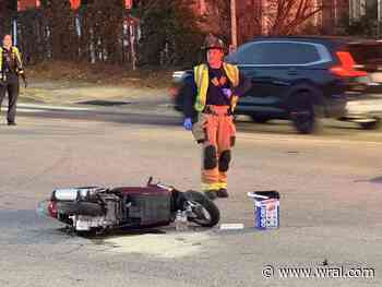At least one person injured in wreck involving two vehicles, motorcycle in Raleigh