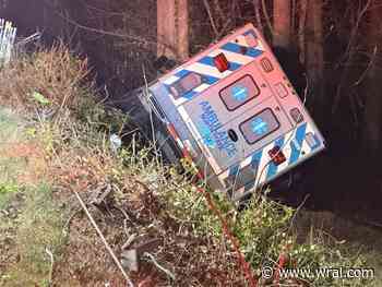 Crews remove overturned ambulance from ditch on Creedmoor Road
