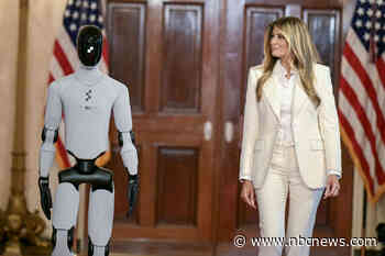Melania Trump walks side by side with humanoid robot at White House summit