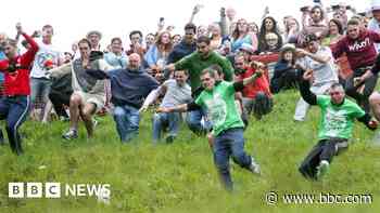What is the Cooper's Hill cheese rolling tradition?