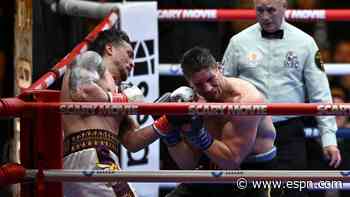 Usyk avoids huge upset with last-second stoppage