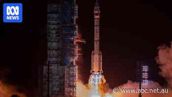 China launches astronauts into space amid new race to Moon