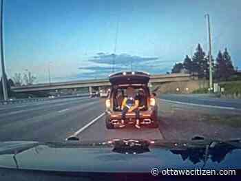 Stunt driving charges laid on Highway 417 after passenger caught riding in trunk with tailgate open