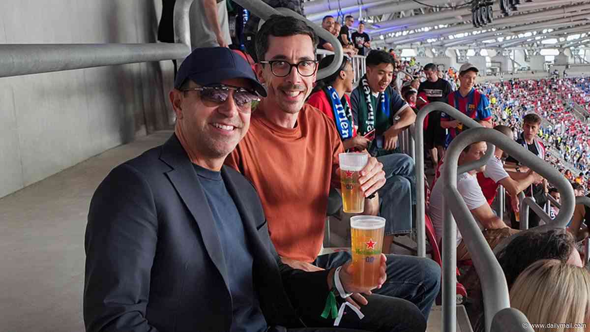 Barcelona legend surprises fan at the Champions League final - as they watch PSG defeat Arsenal before heading pitch-side