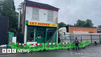 One dead and six hurt as car hits takeaway