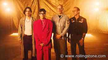 Weezer Preview Self-Titled Album With ‘We Might As Well Be Strangers’ Featuring Wednesday