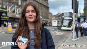 How has free bus travel for young people worked in Scotland?