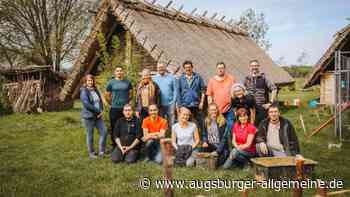 Menschen mit und ohne Behinderung packen im Steinzeitdorf gemeinsam an