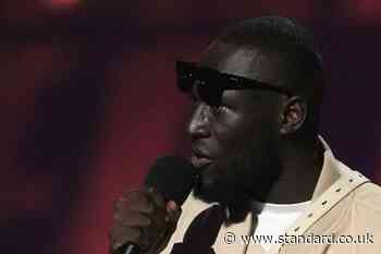 Stormzy fined for using phone while driving £400,000 Ferrari