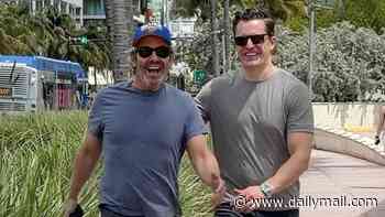 Andy Cohen, 58, and high-powered younger boyfriend Kevin Sobieski put on giddy display months before going public