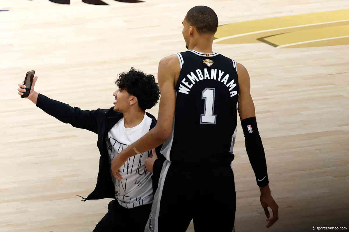 NBA Finals fan who ran onto court for Wemby selfie arrested, banned