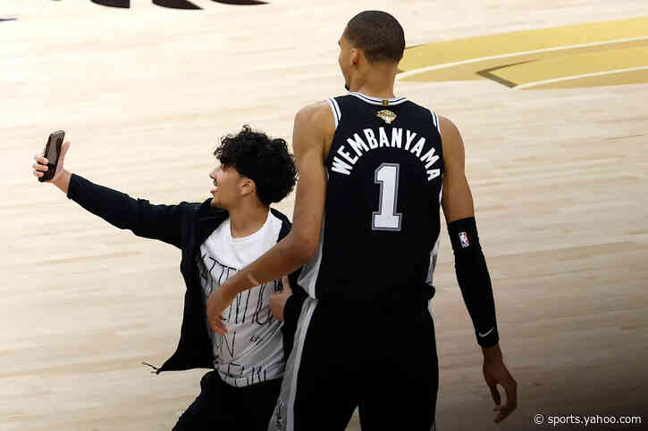 NBA Finals fan who ran onto court for Wemby selfie arrested, banned